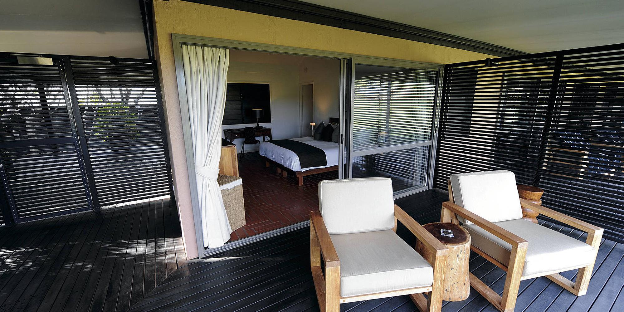 Veranda met uitzicht op de tuin