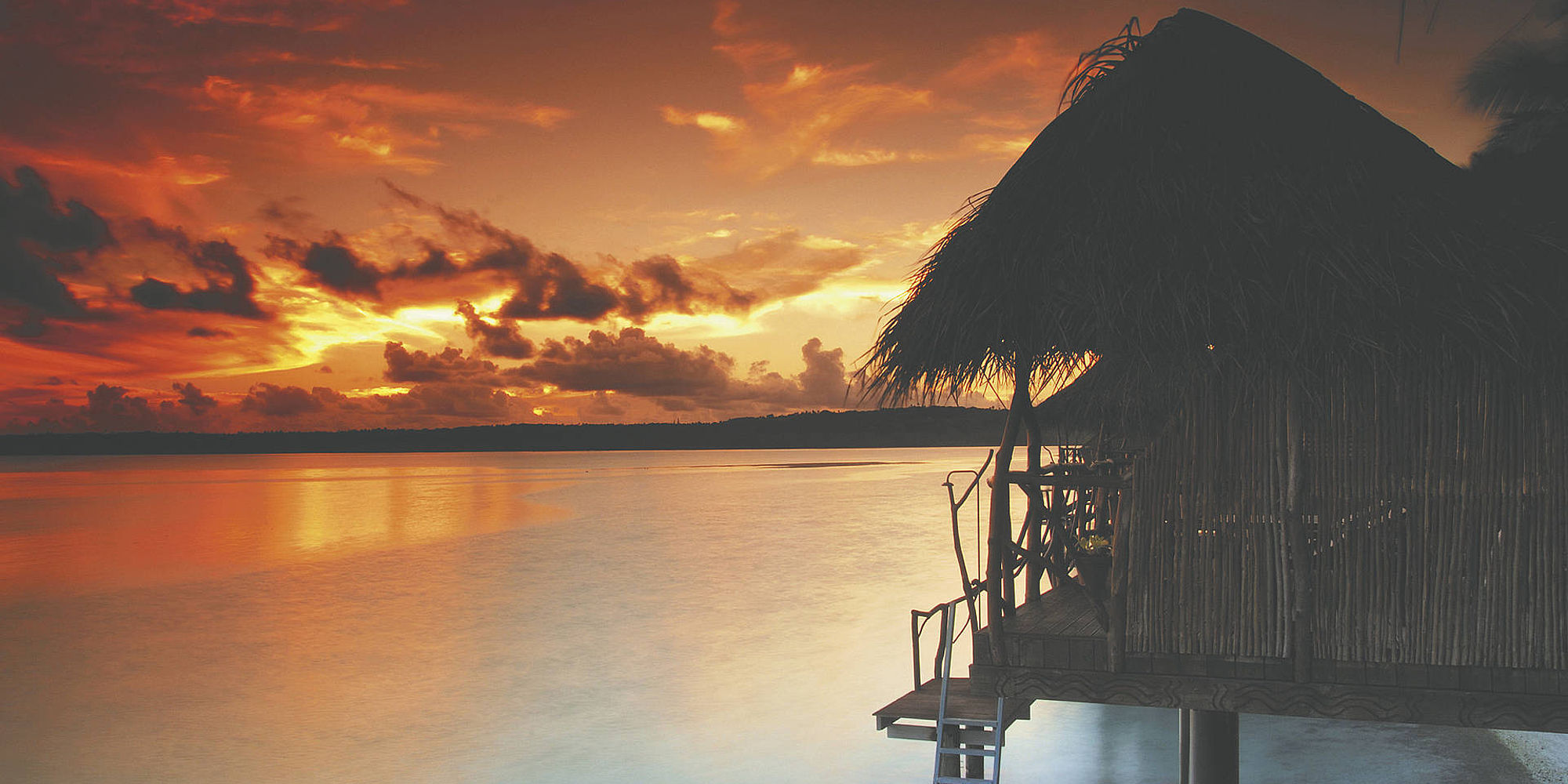 Aitutaki Lagoon Private Island Resort zonsondergang | cookeilanden